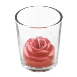 Bougie rose rouge dans pot en verre