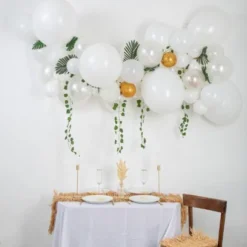 Kit arche 55 ballons et feuilles tropicales - Tropichic